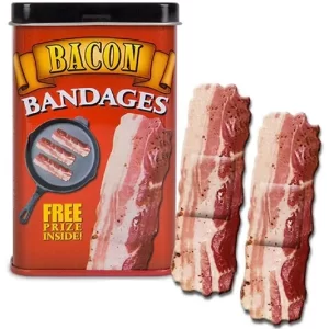 Pack of bacon strips adhesive bandages displayed in a tin container, featuring humorous designs, ideal for fun gifts and novelty items.