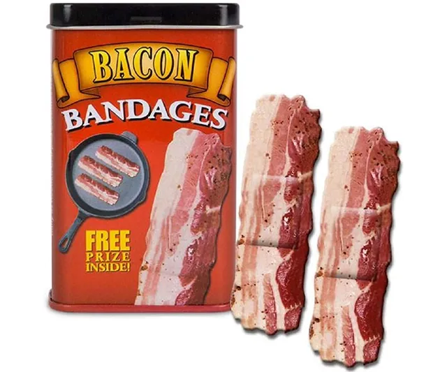 Pack of bacon strips adhesive bandages displayed in a tin container, featuring humorous designs, ideal for fun gifts and novelty items.