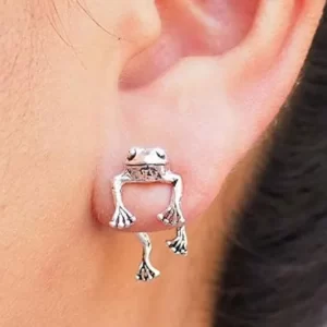 Close-up of silver frog-shaped stud earrings for women, with a cute animal design, featured on IGottaHaveItNow.