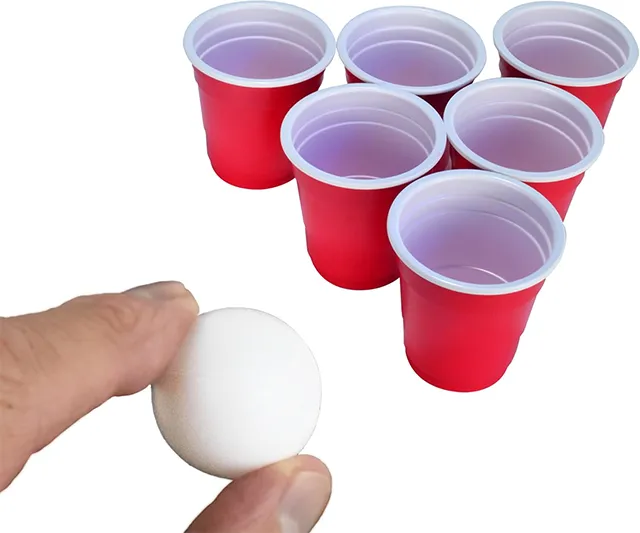 Miniature red beer pong set featuring tiny cups and balls for an adult drinking game twist. Check it out on IGottaHaveItNow.