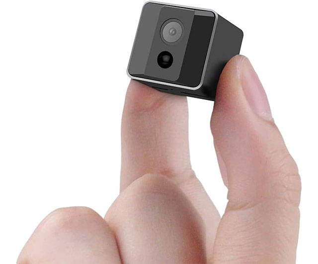 Mini spy cam hidden camera for discreet surveillance, compact design with night vision and motion detection.